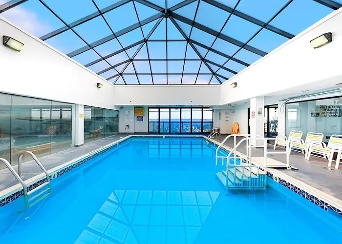 Elegant Beachfront With Balcony Washer & Dryer Ac Pools Sauna & Gym Holiday home